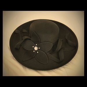 Large brim black hat